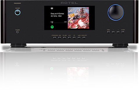 Rotel stereo amplifier with digital display on a white background